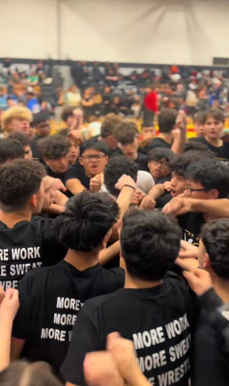 School team wearing jerseys and tracksuits